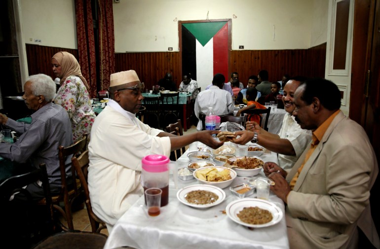 Sudanese gather to eat Iftar meal during the holy month of Ramadan at El-Sudan home in Cairo, Egypt June 1, 2019. Picture taken June 1, 2019. REUTERS/Hayam Adel