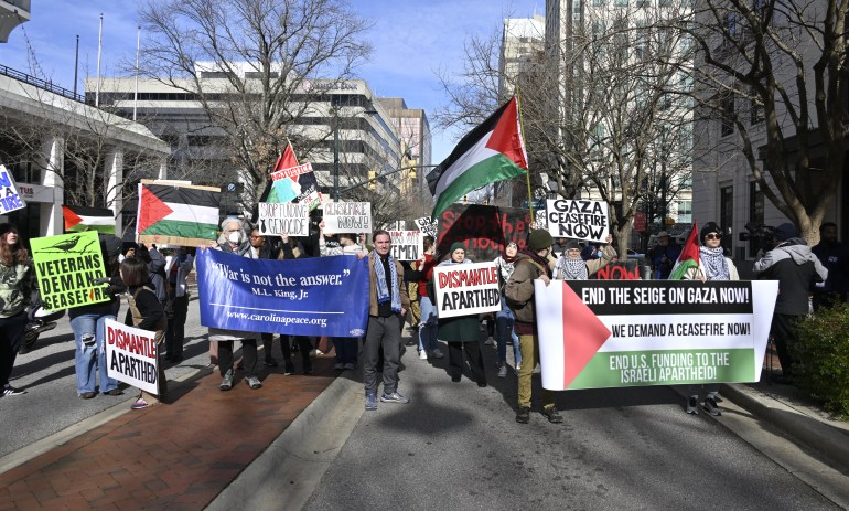 COLUMBIA, USA - JANUARY 15: Pro-Palestinian demonstrators carry Palestinian flags and banners as US Vice President Kamala Harris speaks during the 'Ballots for Freedom, Ballots for Justice, Ballots for Change!' in front of the State Capitol in Columbia, SC, United States on January 15, 2024. (Photo by Peter Zay/Anadolu via Getty Images)
