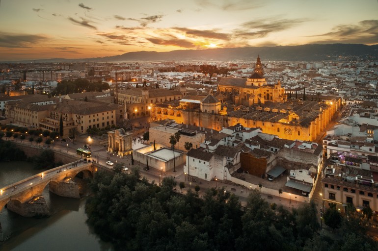 The Mosque–Cathedral of Córdoba aerial view at night in Spain.