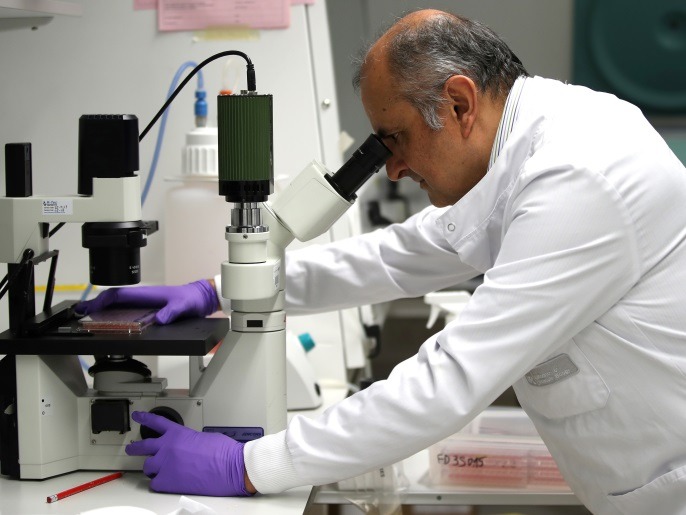 Professor Ketan Patel works in the lab at MRC Laboratory of Molecular Biology in Cambridge, Britain January 2, 2018. Picture taken January 2, 2018. REUTERS/Chris Radburn