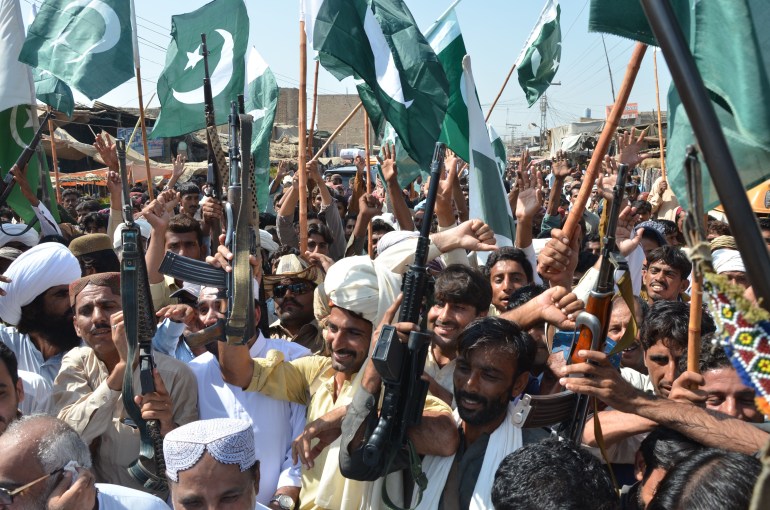 Pakistani Baloch raises guns in an anti-Indian protest in Dera Allayar on October 19, 2016, in the support of Pakistan army. Tensions have spiked since New Delhi said last week it had launched "surgical strikes" on militant posts across the disputed border that divides the Kashmir region between India and Pakistan.