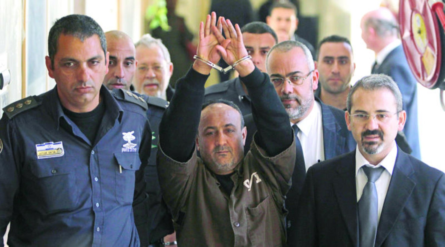 مروان البرغوثي، أمام محكمة إسرائيلية في تل أبيب في 20 مايو/آيار 2004-رويترز، أرشيفية<br>