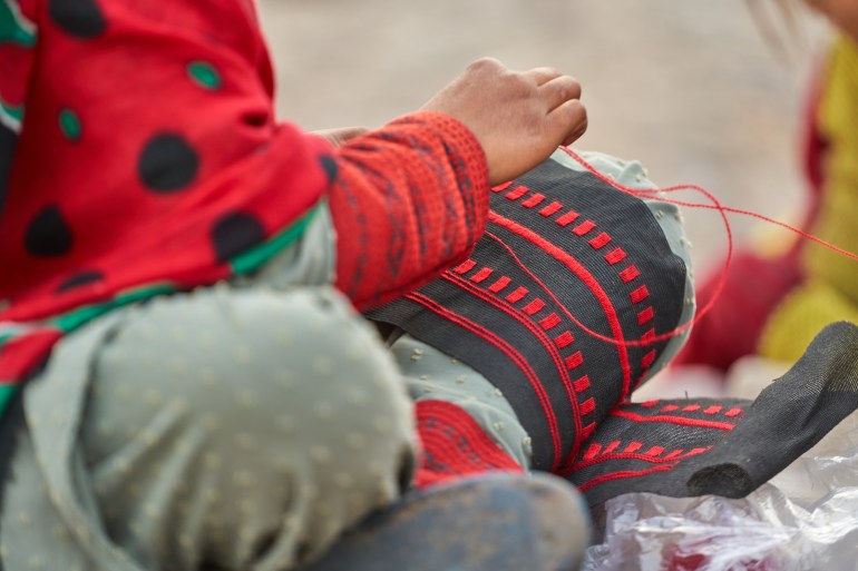 Sewing Balochi clothes by nomadic women