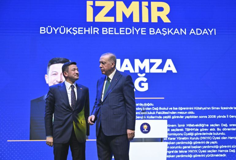 ANKARA, TURKIYE - JANUARY 18: Turkish President and leader of Justice and Development (AK) Party Recep Tayyip Erdogan (R) announces Hamza Dag (L) as Izmir Mayoral Candidate during his party's Candidate Announcement Meeting at ATO Congresium in Ankara, Turkiye on January 18, 2024. (Photo by Emin Sansar/Anadolu via Getty Images)