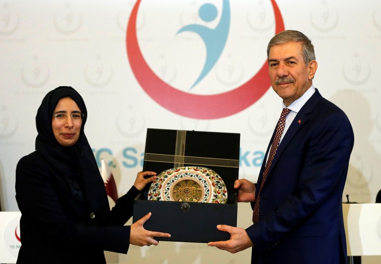 ANKARA, TURKEY - OCTOBER 31: Turkish Health Minister Ahmet Demircan (R) and his Qatari counterpart Hanan Mohammed Al Kuwari (L) pose for a photo during a joint press conference following their meeting in Ankara, Turkey on October 31, 2017. (Photo by Mehmet Ali Ozcan/Anadolu Agency/Getty Images)