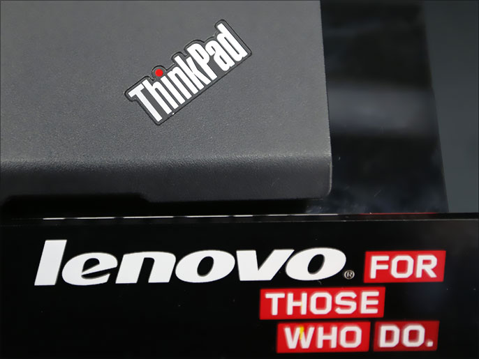 The ThinkPad maker Lenovo's logo is seen at an electronic shop in Tokyo September 5, 2012. Shares of PC maker Lenovo Group Ltd dropped as much as 8.1 percent on Wednesday after Japan's cash-strapped NEC Corp sold its entire stake in the company in a deal worth 18 billion yen ($229.62 million).