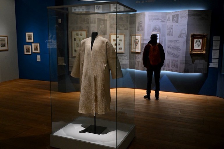 A visitor looks during the exhibition "Abdelkader, a figure of the Algerian independence" at the Mucem Museum in Marseille, southern France, on April 5, 2022. Seen as one of France's worst enemies in the late 19th century, Emir Abdelkader, the Algerian military hero who resisted France's colonisation of the North African country, is considered one of the founders of modern-day Algeria for his role in mobilising resistance to French rule. (Photo by Nicolas TUCAT / AFP) / RESTRICTED TO EDITORIAL USE - MANDATORY MENTION OF THE ARTIST UPON PUBLICATION - TO ILLUSTRATE THE EVENT AS SPECIFIED IN THE CAPTION - RESTRICTED TO EDITORIAL USE - MANDATORY MENTION OF THE ARTIST UPON PUBLICATION - TO ILLUSTRATE THE EVENT AS SPECIFIED IN THE CAPTION