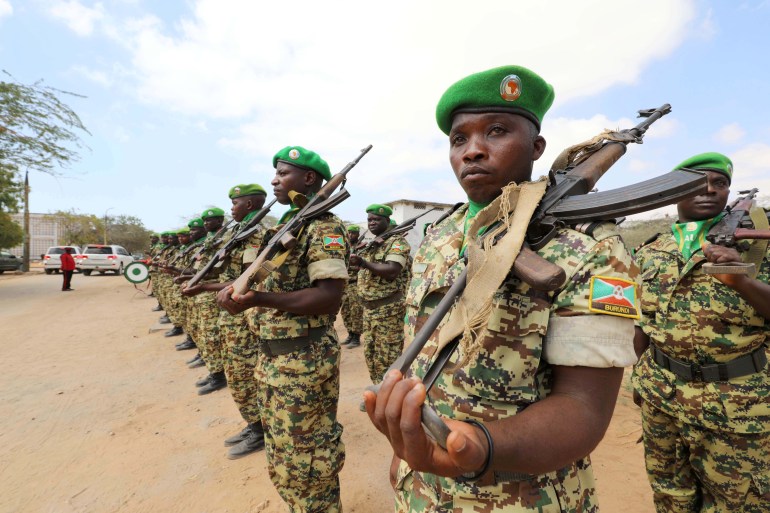 Burundian African Union Mission in Somalia (AMISOM) peacekeepers stand in formation during a ceremony as they prepare to leave the Jaale Siad Military academy after being replaced by the Somali military in Mogadishu, Somalia. February 28, 2019. REUTERS/Feisal Omar