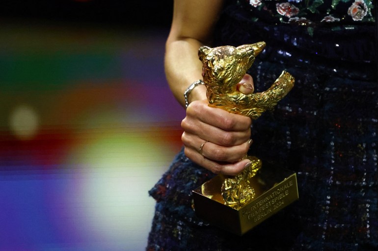 Director Mati Diop receives the Golden Bear for Best Film for 'Dahomey' during the awards ceremony at the 74th Berlinale International Film Festival in Berlin, Germany, February 24, 2024. REUTERS/Fabrizio Bensch