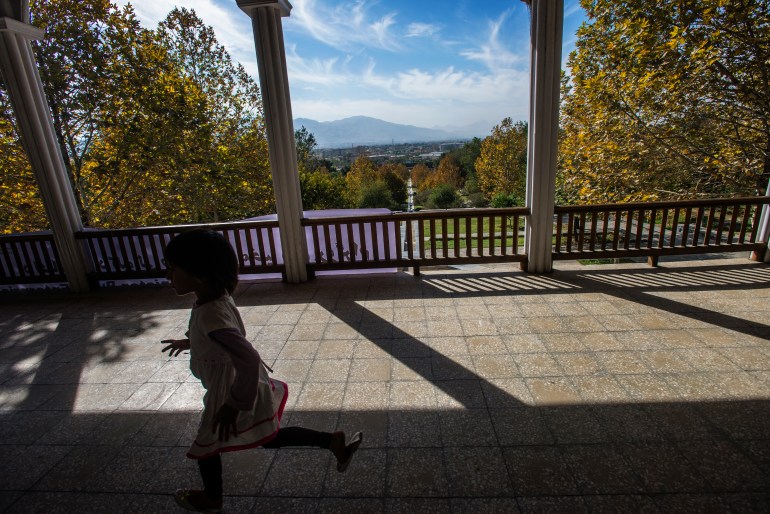 Girl runs through porch of historical mosque inside the Babur's garden, Kabul, Afghanistan (Photo by NurPhoto/NurPhoto via Getty Images)