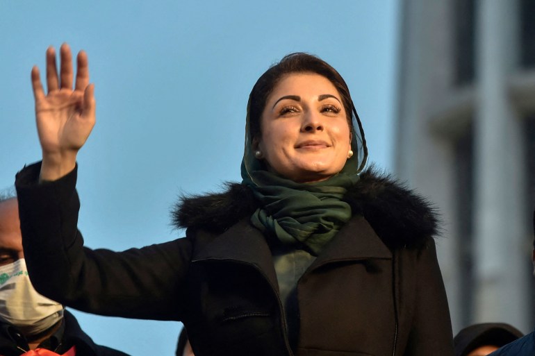 Opposition leader Maryam Nawaz of Pakistan Democratic Movement (PDM) waves to supporters as she arrives to attend an anti-government rally in Lahore on December 13, 2020. (Photo by Arif ALI / AFP)