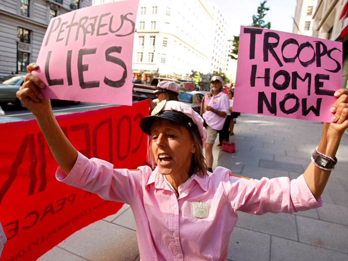 epa01118551 Medea Benjamin of Code Pink protests outside of the National Press Building during a press conference by the commander of coalition forces in Iraq U.S. Army General David Patraeus and U. S. Ambassador to Iraq Ryan Crocker in Washington, D.C. USA 12 September 2007. Patraeus and Crocker have testified before House and Senate Committees on the progress of the Bush administration's surge in Iraq. EPA/SHAWN THEW