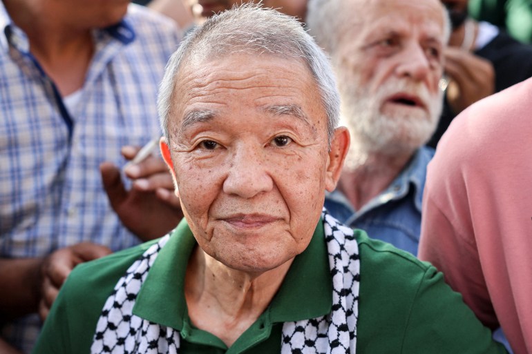 Kozo Okamoto -- the only surviving member of the three-man "Japanese Red Army" (JRA) commando unit that killed 26 people in an attack on Israel's Lod airport on May 30, 1972 -- attends a ceremony organised by Palestinian militants to mark the 50th anniversary of the Lod attack in Lebanon's capital Beirut on May 30, 2022. Palestinian militants in Beirut on May 30 marked the 50th anniversary of a deadly attack carried out by members of the Japanese Red Army at Israel's Lod airport. Kozo Okamoto, the only surviving member of the three-man commando that killed 26 people (including 17 Christian pilgrims from Puerto Rico) on May 30, 1972, made a rare appearance at the ceremony. The attack was planned by the Popular Front for the Liberation of Palestine (PFLP), which has commemorated it every year for a half a century. (Photo by JOSEPH EID / AFP)