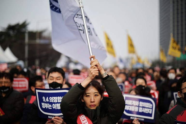 Doctors take part in a rally to protest against government plans to increase medical school admissions in Seoul, South Korea, March 3, 2024. REUTERS/Kim Hong-Ji