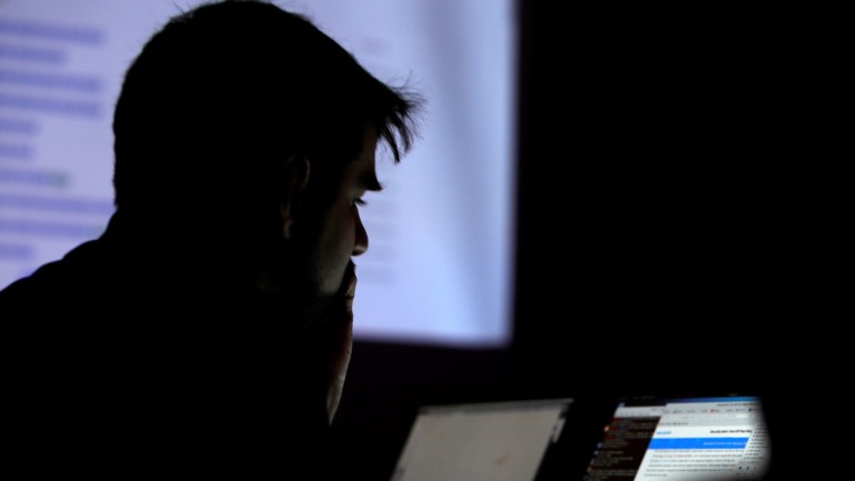 A man takes part in a hacking contest during the Def Con hacker convention in Las Vegas, Nevada, U.S. on July 29, 2017. REUTERS/Steve Marcus