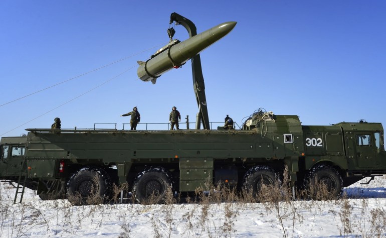 Russian troops load a missile onto an Iskander M launcher during a 2016 exercise. Russia is now deploying the missiles to Kaliningrad, a Baltic territory it controls. Yuri Smityuk TASS via Getty Images