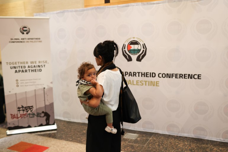 Lara Kiswani arrives with her baby Salma Kiswani aged one, 10 May 2024, at the Sandton Convention Centre in Johannesburg, South Africa during the Global Anti-Apartheid Conference on Palestine. Picture: SUPPLIED/ Alaister Russell الصورة مصدرها الجزيرة بحسب الزميل احمد حافظ