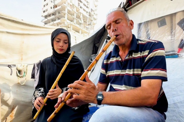 غزة.. عزف على أوتار المقاومة وسط دمار الحرب والحصار غزة.. عزف على أوتار المقاومة وسط دمار الحرب والحصار