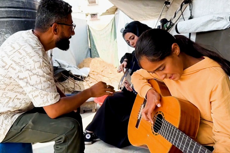 غزة.. عزف على أوتار المقاومة وسط دمار الحرب والحصار غزة.. عزف على أوتار المقاومة وسط دمار الحرب والحصار