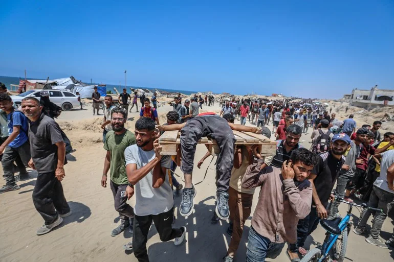 ما ما "منطقة الموت" التي يعبرها الغزيون من أجل الطحين؟