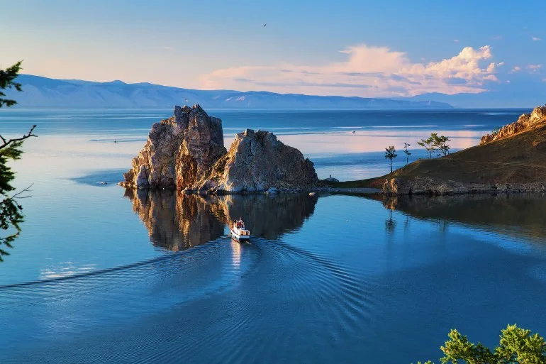 Burhan Cape and Shaman Rock of Olkhon Island on Baikal Lake at sunset, Russia