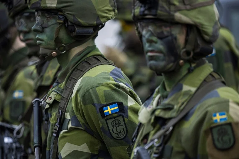 Soldiers from the 13th counter intelligence battalion, 2nd reconnaissance platoon of the Swedish Armed Forces, participate in military exercise in Kungsangen, near Stockholm on February 27, 2024. (Photo by Jonathan NACKSTRAND / AFP)